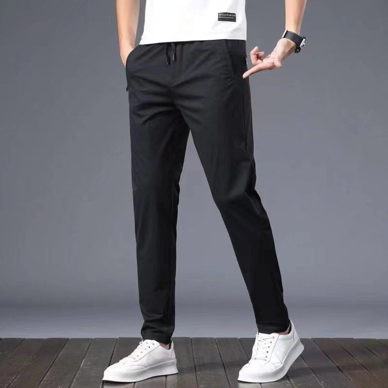 【اشتري واحدة واحصل على واحدة مجانا】Spring ice silk sports men's casual trousers